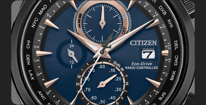 Close-up of the new Citizen Sports Luxury timepiece with a deep blue dial, with a vertical three-register chronograph. Appliques of rose gold-tones add dimensionality.