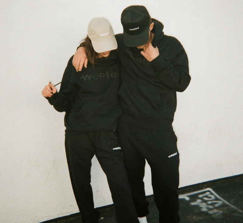 (image of a man and woman in hiyo's never wasted collection merch)