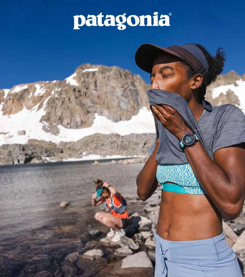 Patagonia. A trail runner cools off at an alpine lake.