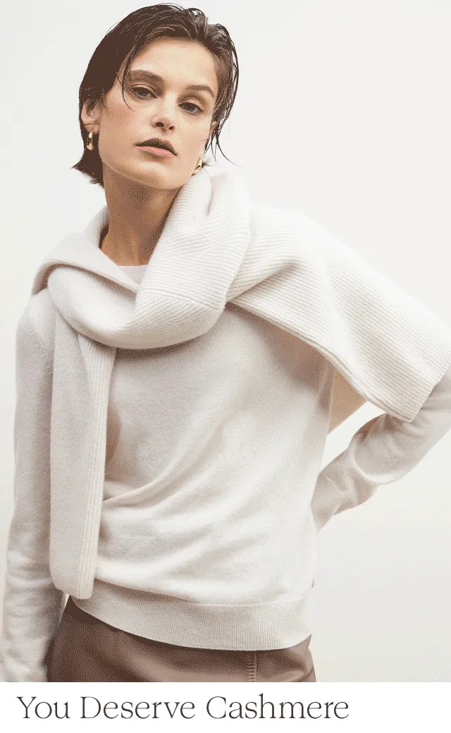 A woman wearing a cashmere sweater.