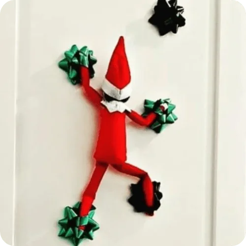 elf on the shelf ideas like the elf rock climbing on bows elf on the shelf ideas like the elf rock climbing on bows