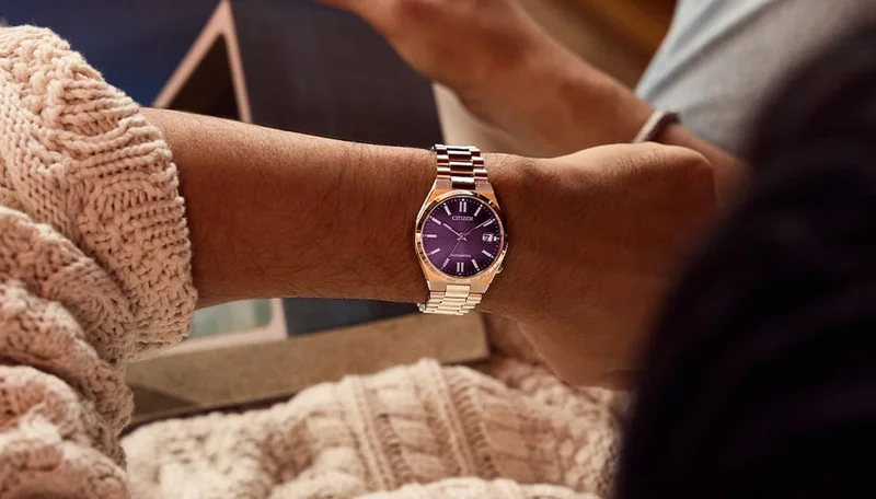 Man wearing a purple dial TSUYOSA