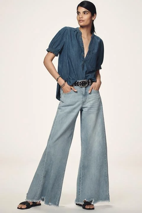 The Adi Regenerative Cotton Mid-Rise Frayed Relaxed Flare Jeans by Pilcro