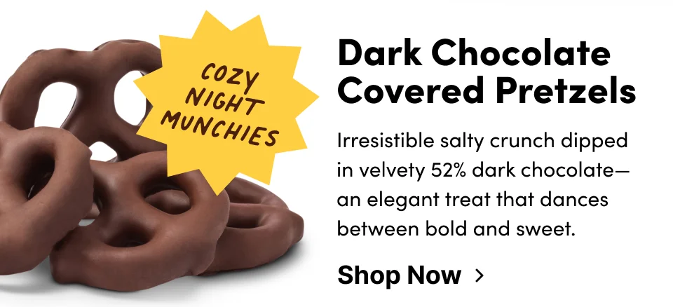Dark Chocolate Covered Pretzels – Irresistible salty crunch dipped in velvety 52% dark chocolate–an elegant treat that dances between bold and sweet; shop now
