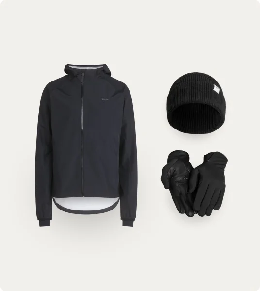 A photograph. A set of Cowboy branded cycle clothing.