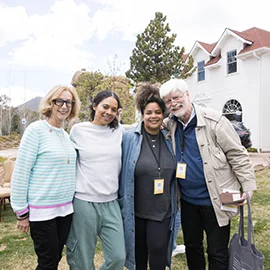 Michelle Satter and lab fellows smile.