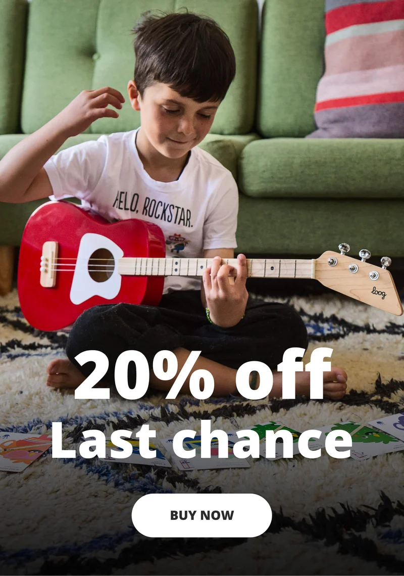 boy playing loog guitar - Memorial day sale 20% off  - Last chance