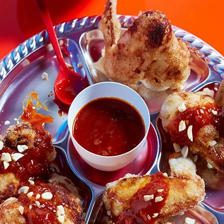 Sticky chicken wings paired with homemade BBQ sauce from nourish by nutribullet.
