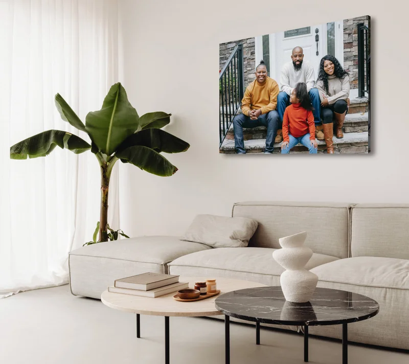 Family living room featuring a canvas print family portrait.
