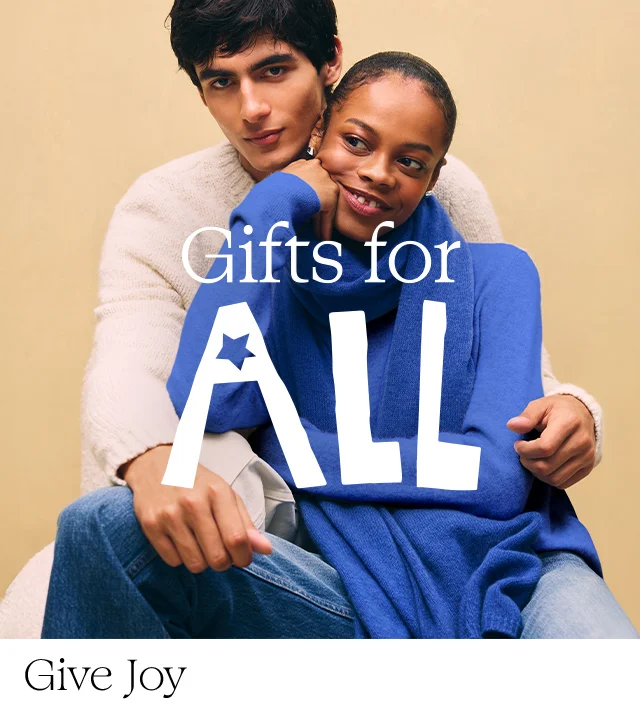 Gifts for all. A man and woman wearing sweaters and scarves.