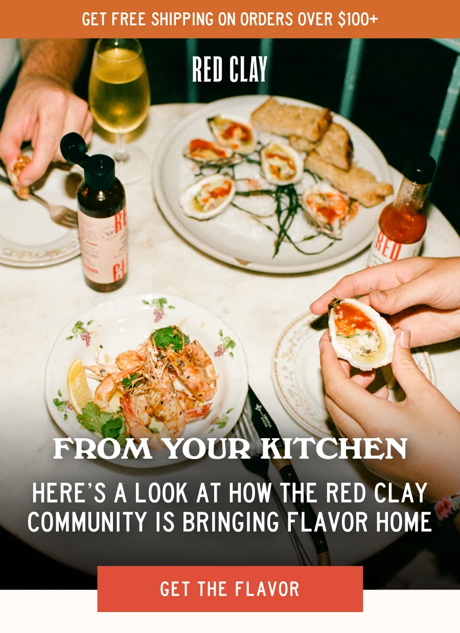 an image of a person pouring sauce on a hot sauce