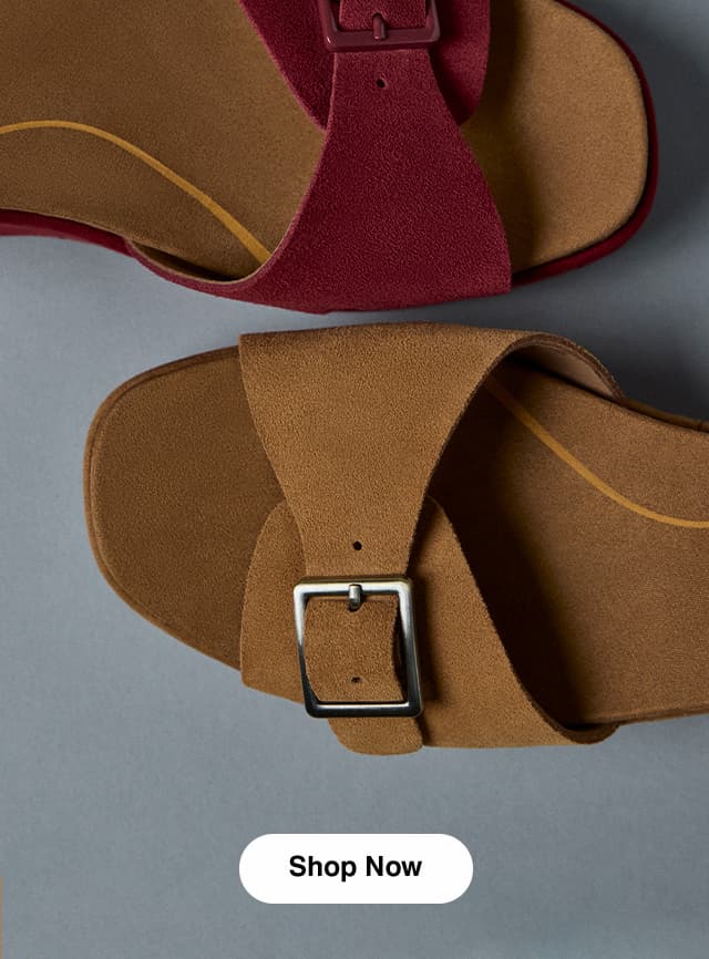 A close-up of the Baminda wedge sandal buckled vamp in ruby suede and tan suede. Shop Now.