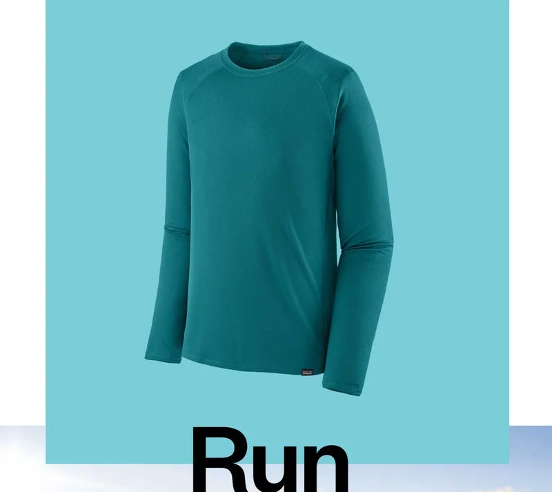 The word run and an image of the men’s R1 Air Full-Zip Hoody in blue over a photo of two people running on a trail through the mountains.