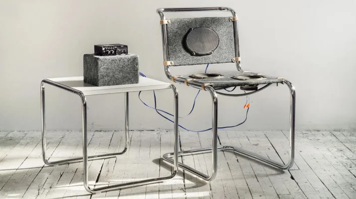 Repurposed salvage car parts to reinvent classic chairs