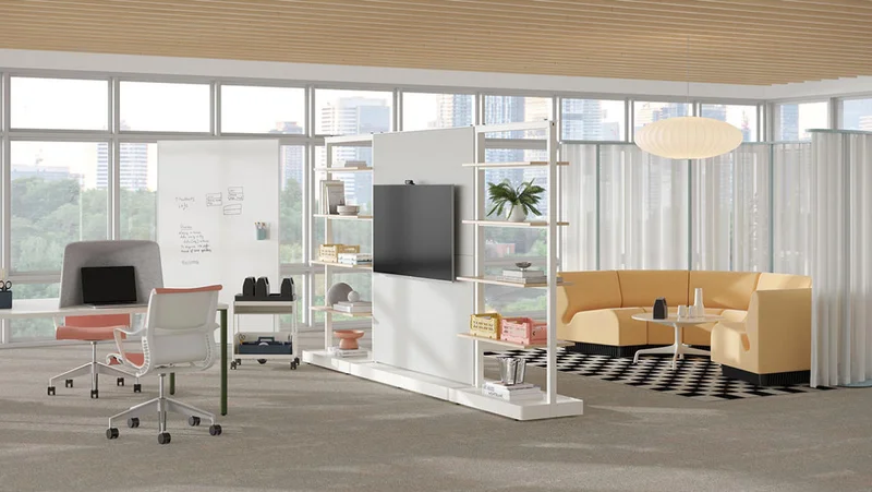 Open floor office with an OE1 Communal Table, OE1 Agile Walls, OE1 Mobile Easel, Chadwick Sofa, and OE1 Freestanding Curtains.