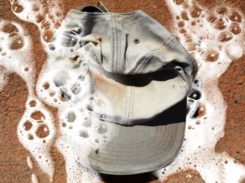 Image may contain: Baseball Cap, Cap, Clothing, Hat, and Person