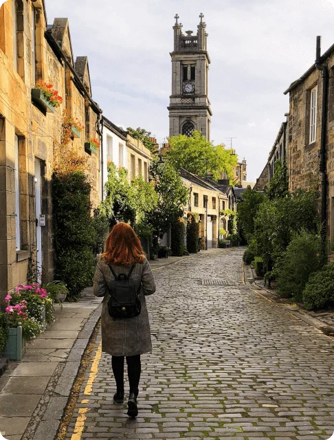 Image Description: A traveler walking down Circus Lane in Edinburgh