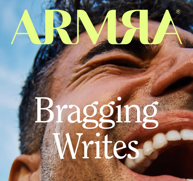 Close-up of a smiling person’s face with the headline ‘ARMRA Bragging Writes.’