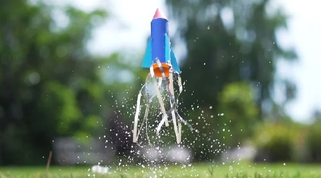 Create custom rockets that pop their top with water + a fizzy tablet!