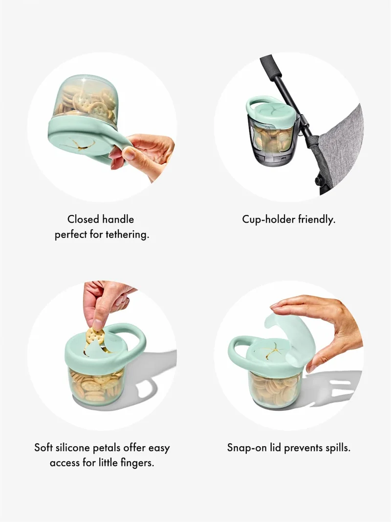 Closed handle  perfect for tethering. Cup-holder friendly. Soft silicone petals offer easy access for little fingers. Snap-on lid prevents spills.