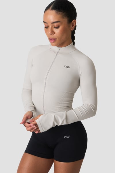 Image of Sculpt Seamless 2-Way Zip LS Light Dusty Beige