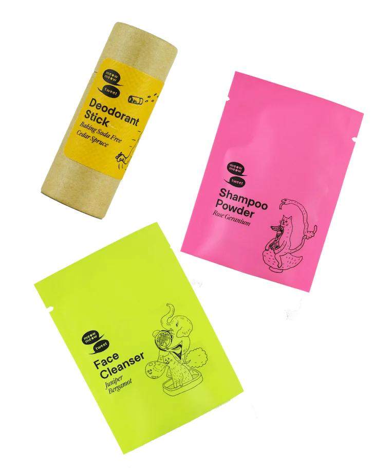 An array of colorful mini sized skincare and bodycare products..