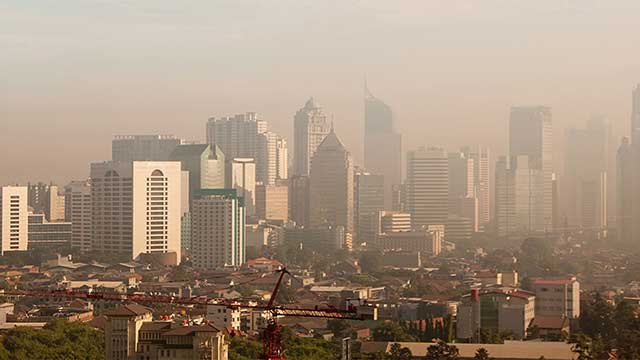 A city shrouded in smog.