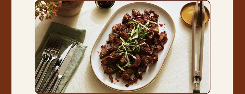 Roasted Japanese Sweet Potatoes with Chili Crisp Pecans | Sweet, spicy, and perfectly stickly.