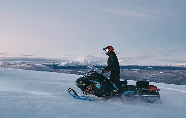 Person riding a Lynx crossover sled
