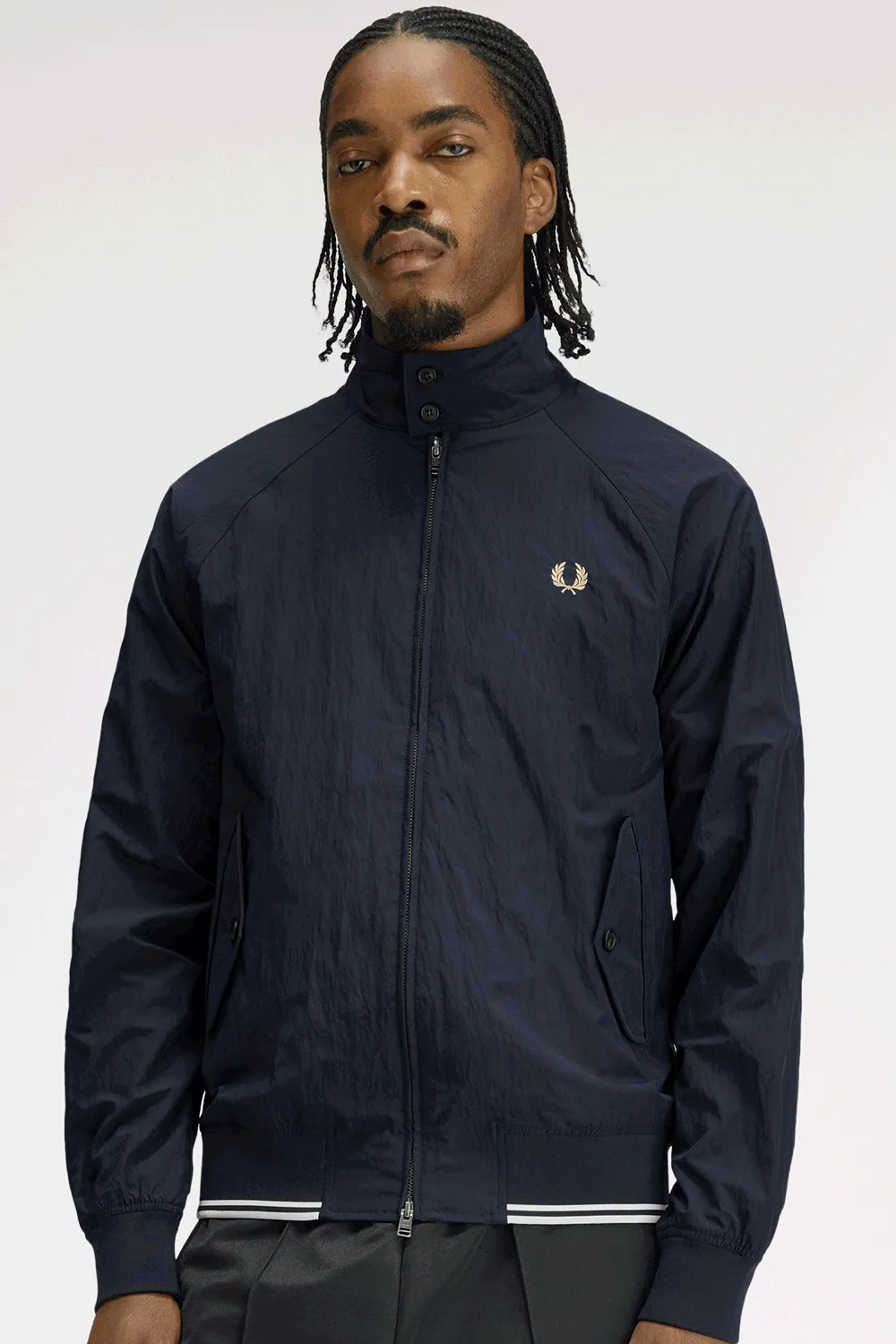 GIF of different shots on the crinkle Harrington Jacket in its different colourways; red, navy and ecru
