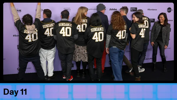 Festival programmers with baseball jerseys that say "Sundance 40" on them.