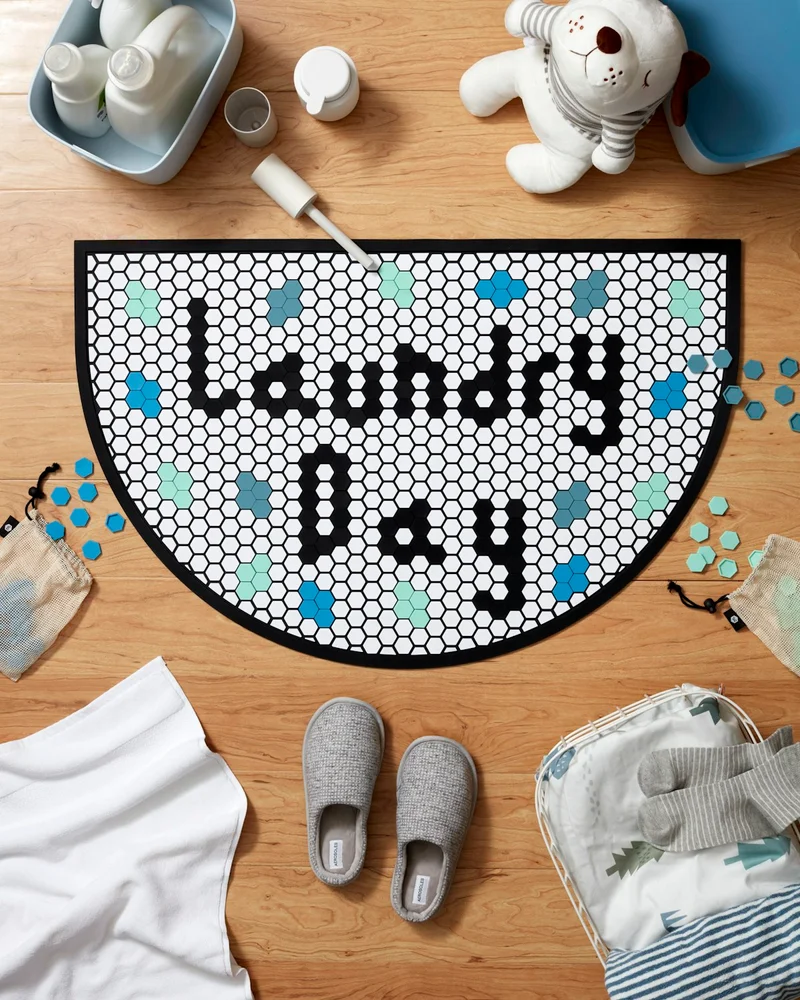 Stay motivated in your laundry room with the half-moon tile mat.