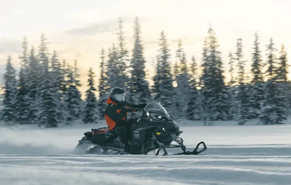 Rider driving a Lynx Xterrain RE sled