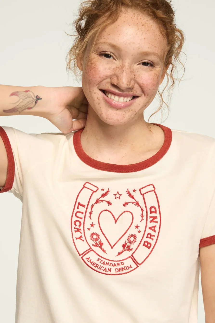 Image of Lucky Brand Horseshoe Ringer Tee - Women's Clothing Tops Shirts Tee Graphic T Shirts in Gardenia