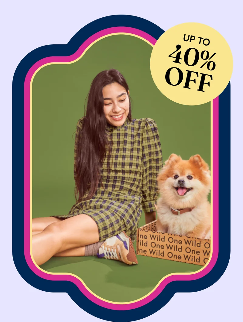 girl in christmas holiday outfit with dog in wild one box