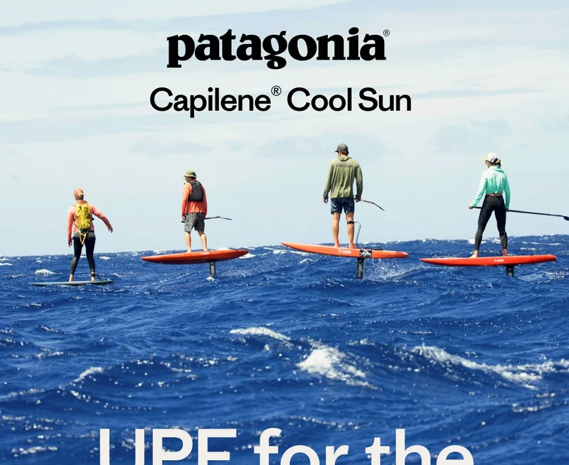 Patagonia. Four people ride foil surfboards in the open ocean.