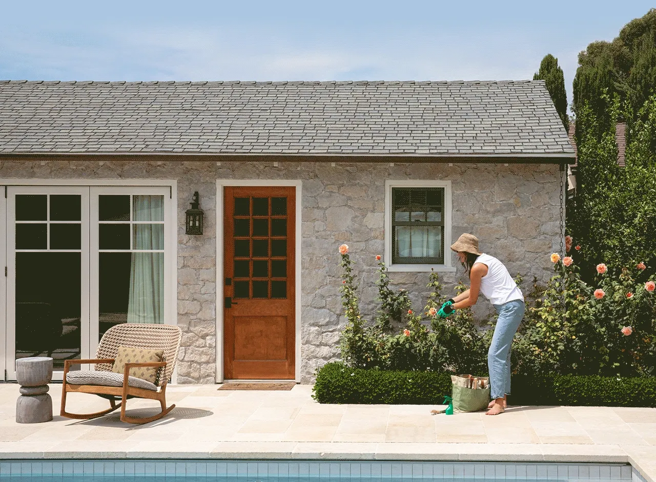 Animated image showing various Arlo security products popping up around a house near a garden and pool while a person tends to the garden.