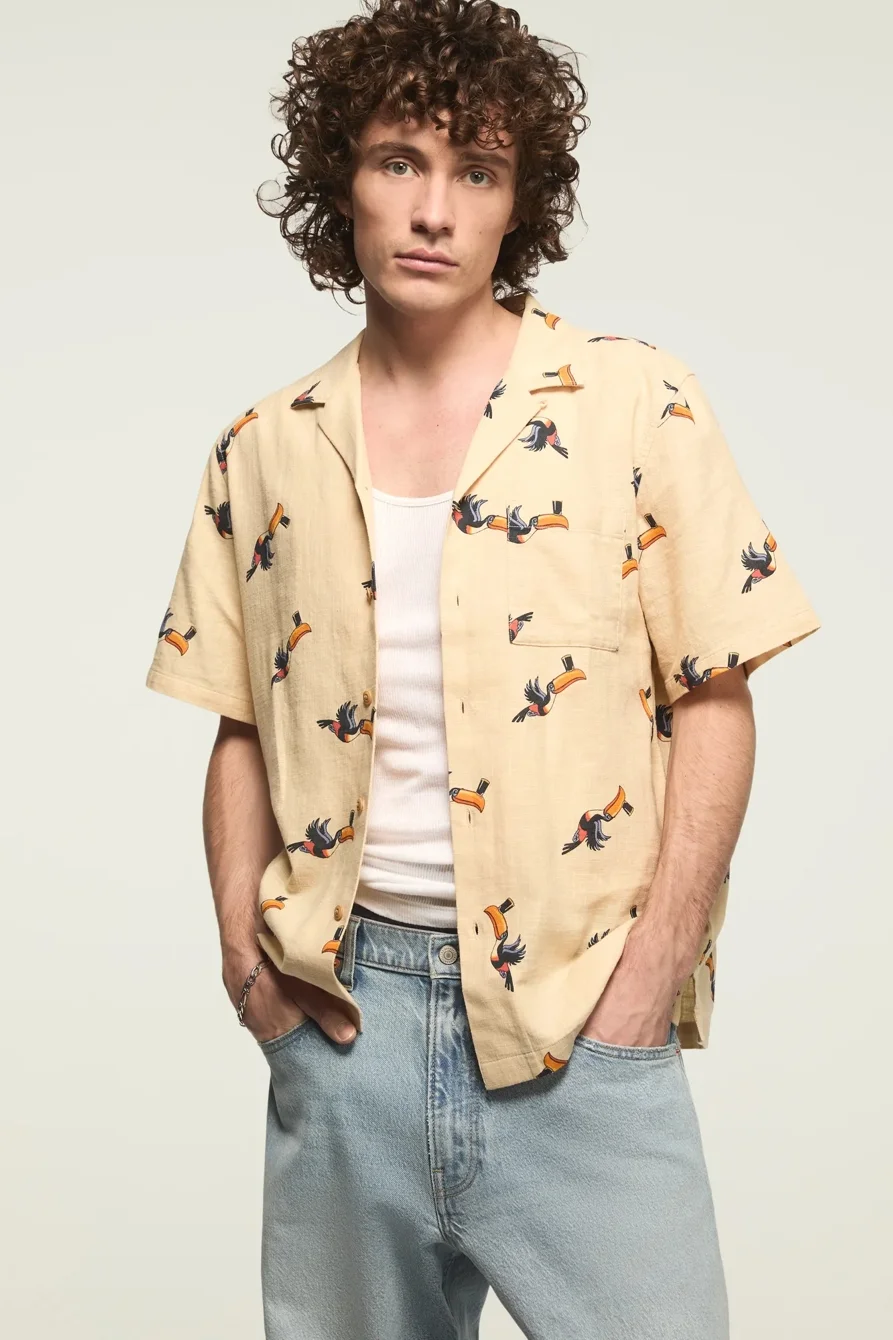 Image of Lucky Brand Guinness Toucan Print Camp Collar Shirt - Men's Clothing Outerwear Shirt Jackets in Natural Multi Print