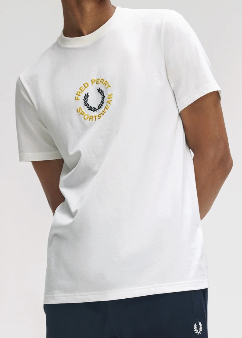 Fred Perry New Releases: model wears a Fred Perry Sportswear Graphic T-Shirt