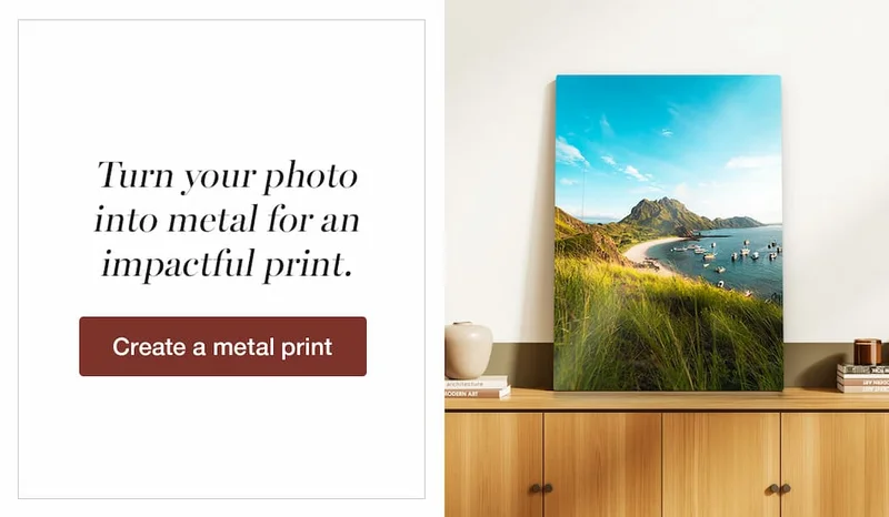 an image of a picture of a beach with a boat on the water