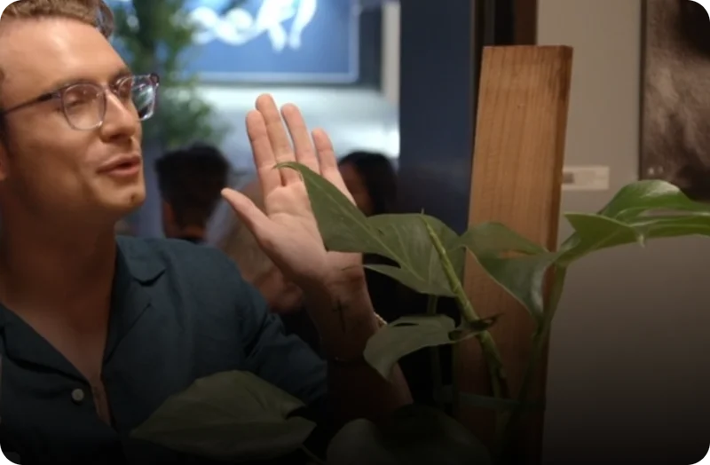 James Kennedy getting a monstera as a gift. CREDIT: All screenshots taken from “Notes on a Scandal,” discount code, "Vanderpump Rules", Bravo TV, NBCUniversal, 2024