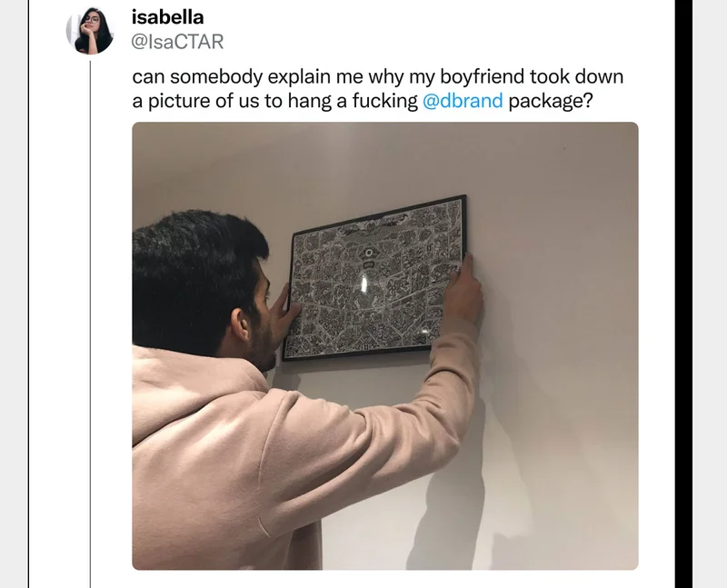 Can somebody explain me why my boyfriend took down a picture of us to hang a dbrand package?