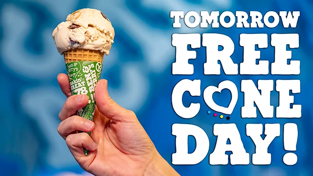 Hand holding a cone with ice cream. Text reads: Tomorrow Free Cone Day!