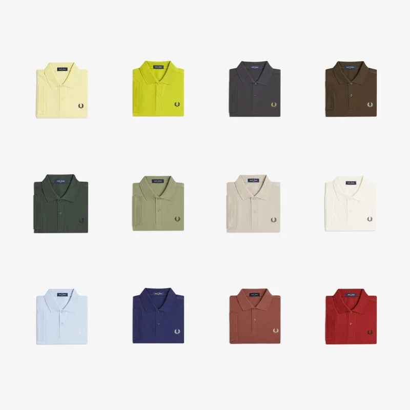 a selection of one-colour Fred Perry polos in different colours