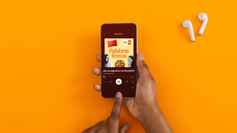 photo of phone with podcast playing