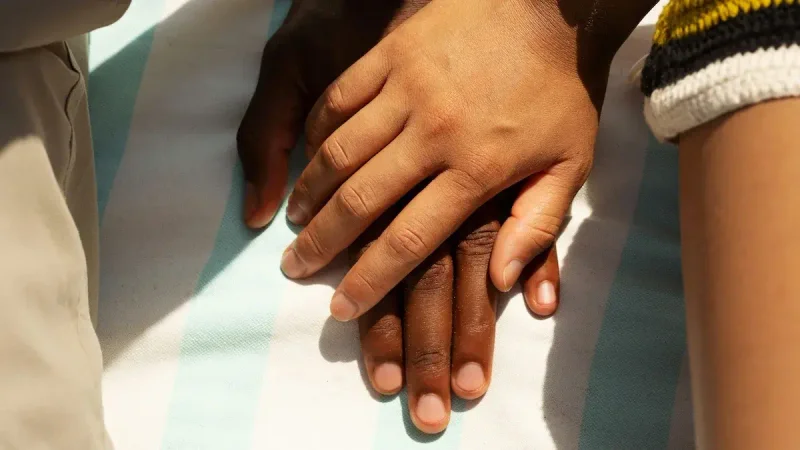 photo of hand holding