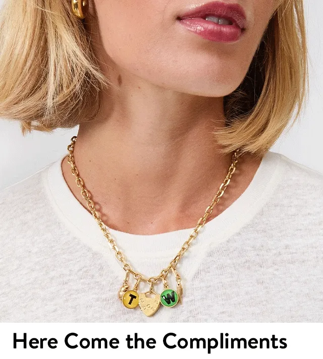 Women wearing charm necklaces.