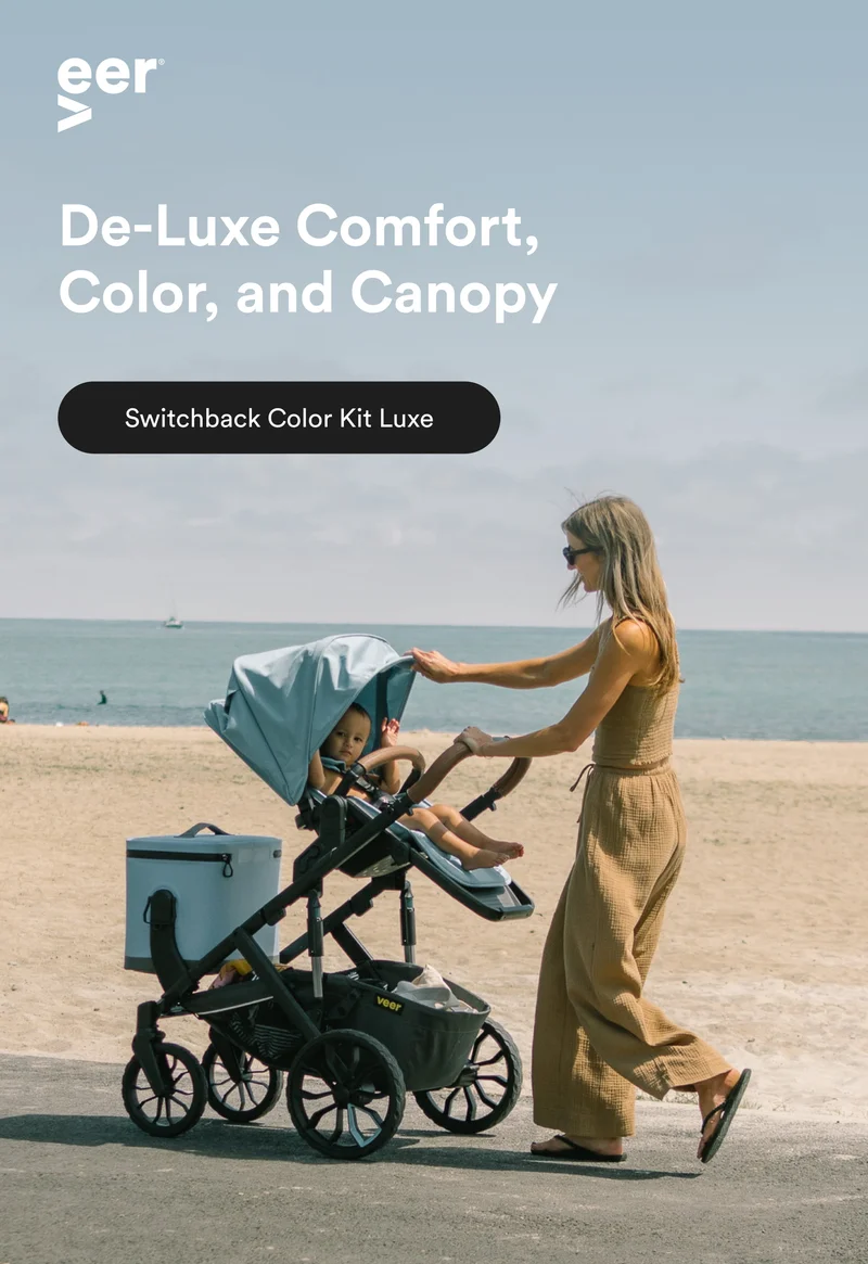 Mom pushing Switchback in new color Blue Beryl