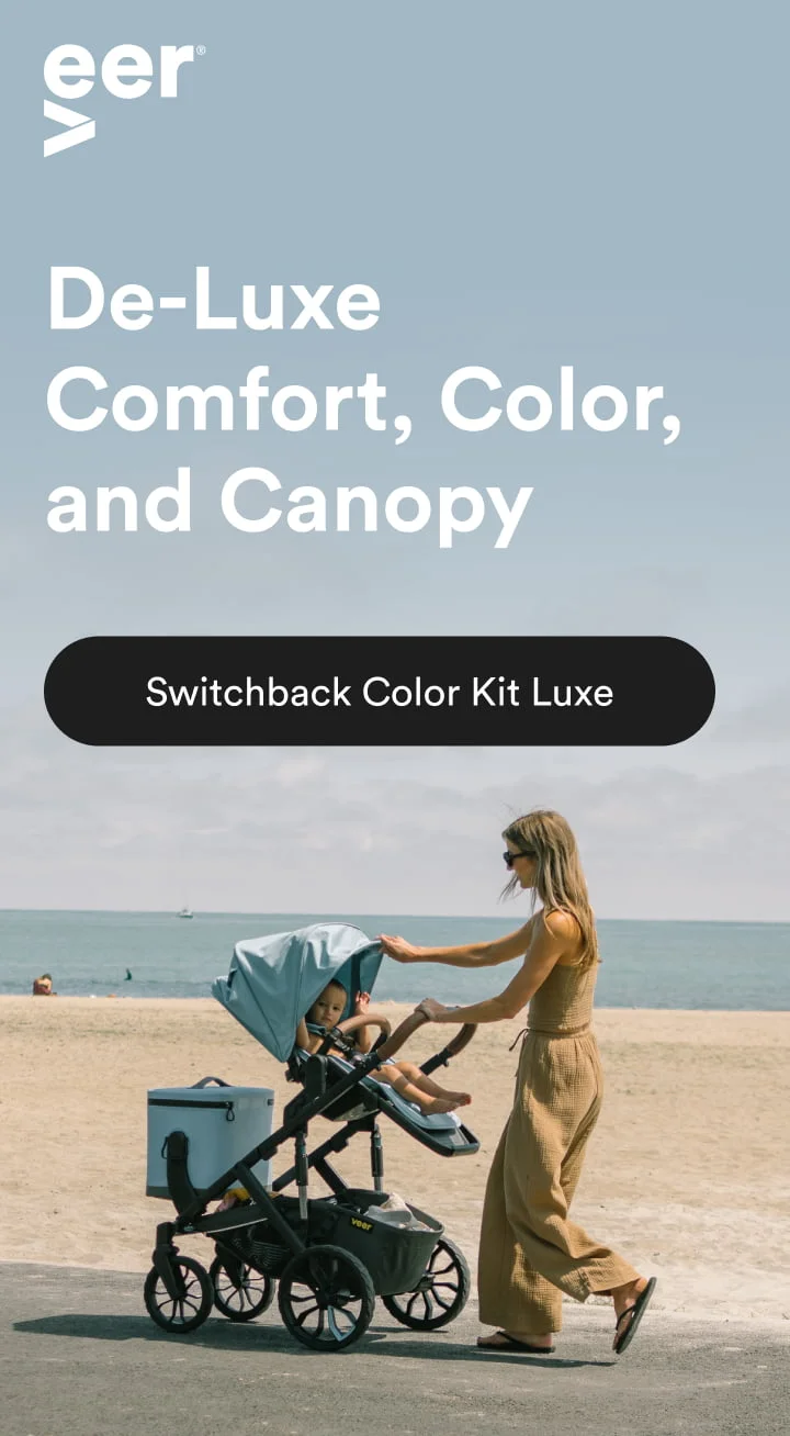 Mom pushing Switchback in new color Blue Beryl