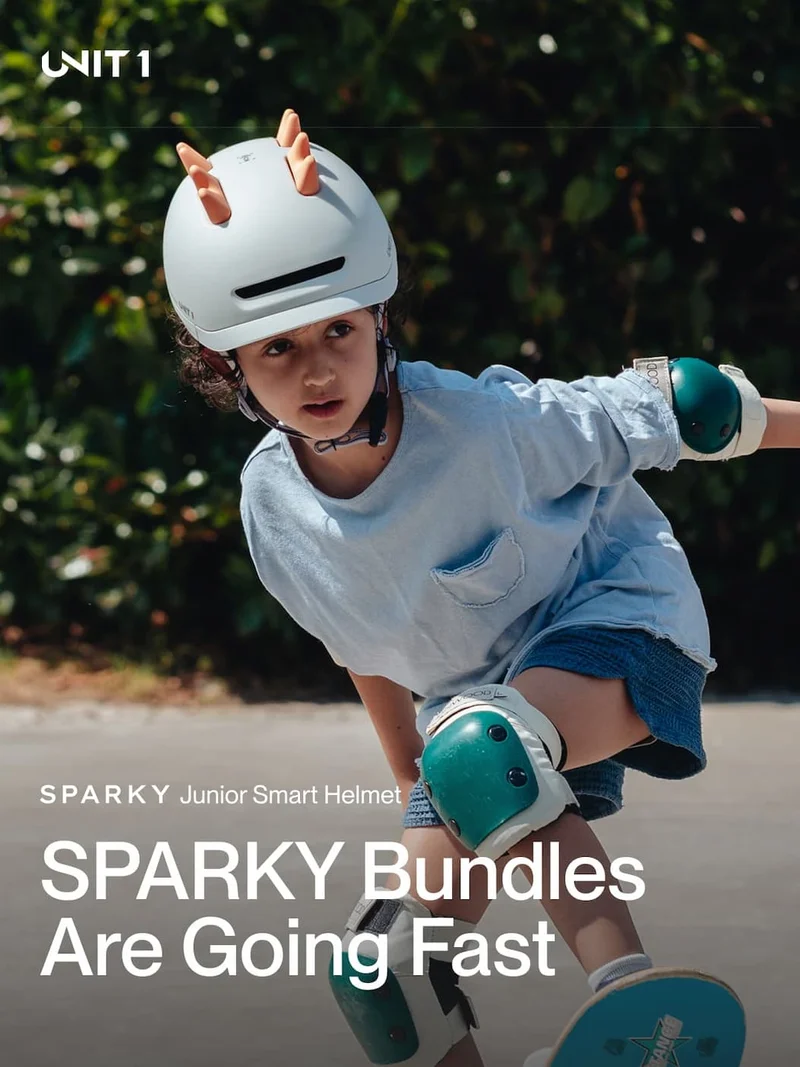 Young child wearing a SPARKY Junior Smart Helmet while skateboarding, showcasing the helmet’s fun silicone add-ons and secure fit.